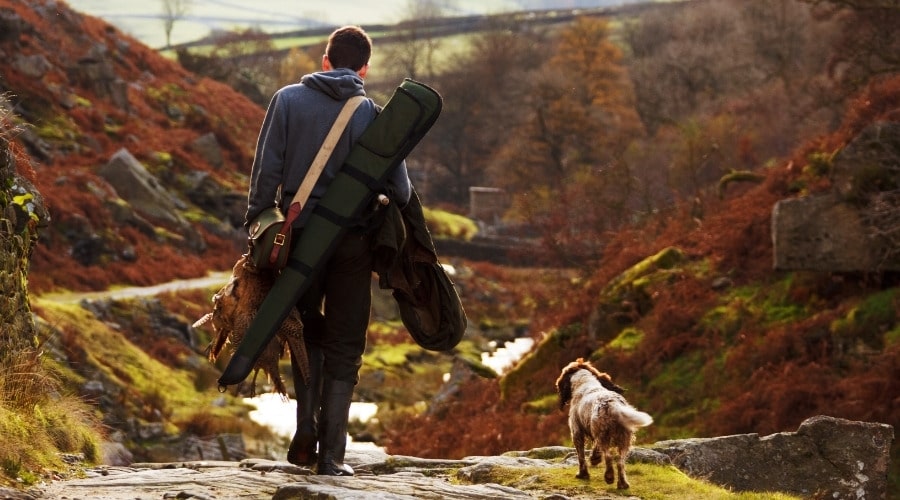 A shooter and their gundog