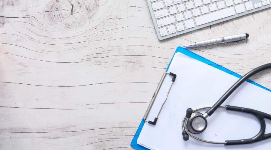 A clipboard with a stethoscope