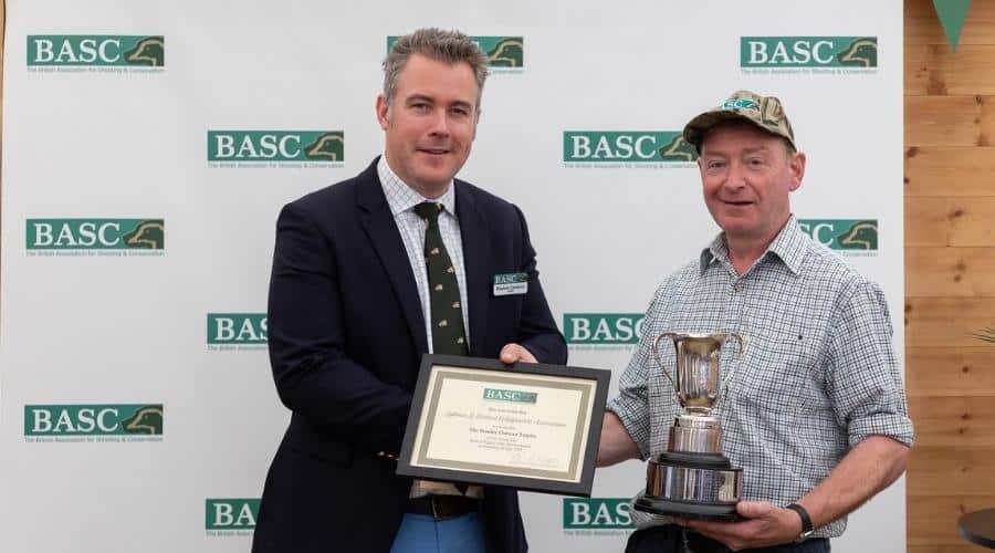 Eoghan Cameron presenting the Stanley Duncan Conservation Trophy.