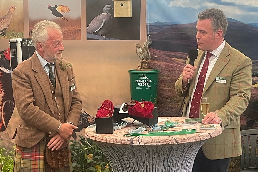 Colin Shedden speaking to BASC chairman Eoghan Cameron