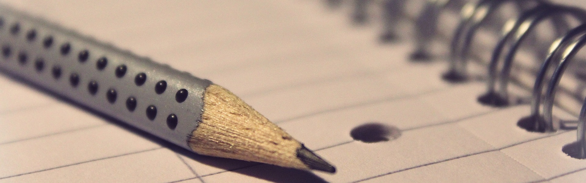 A pencil on a notepad