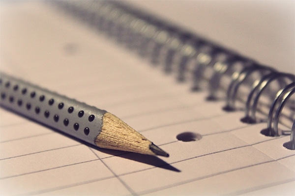 A pencil on a notepad