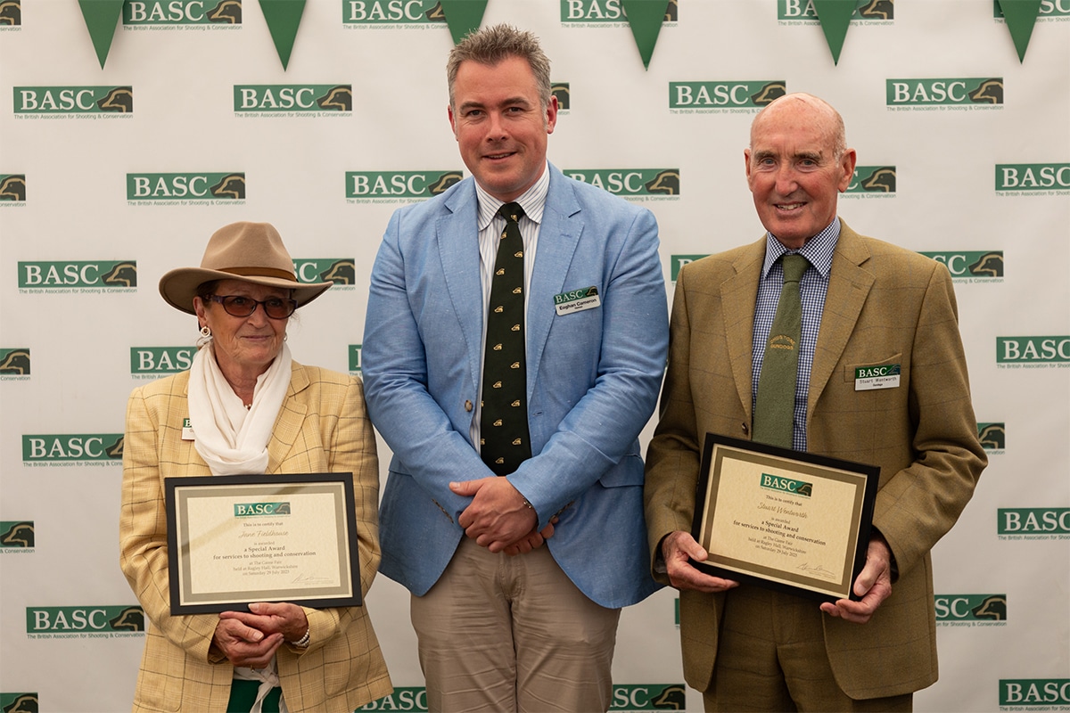 BASC Chairman Eoghan Cameron presenting an award to Stuart Wentworth and Jane Fieldhouse