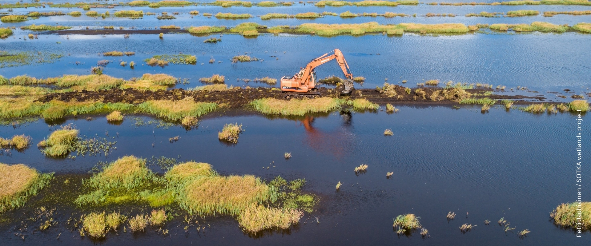 Digger working in SOTKA wetlands