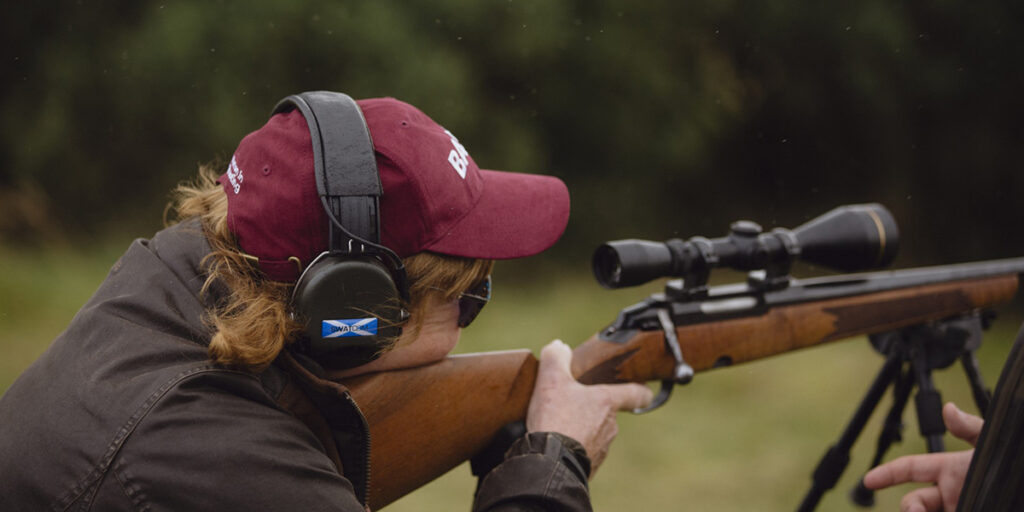 Simulated shooter looking down a scope