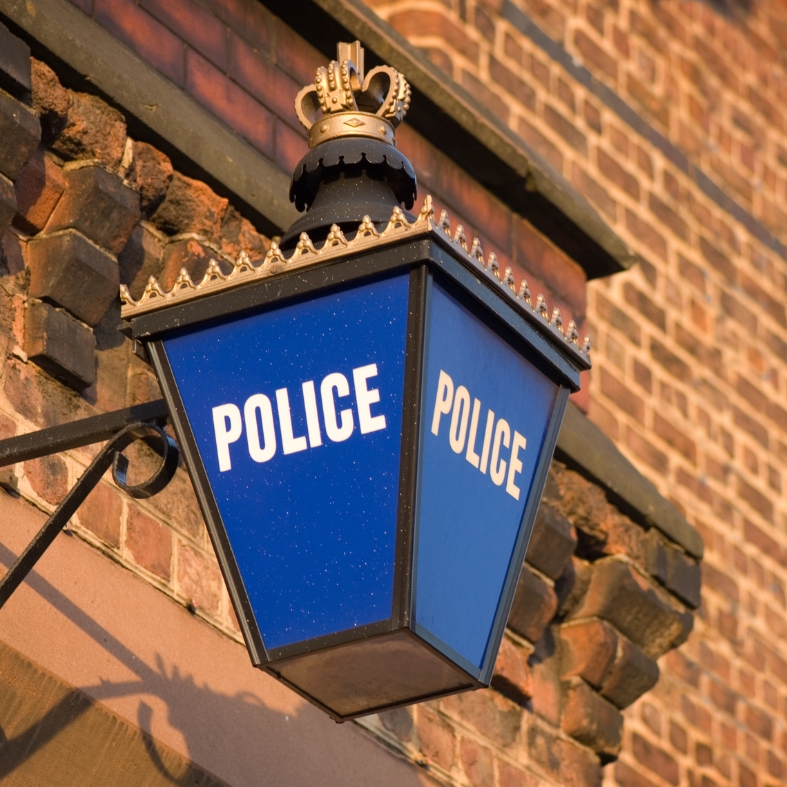 police sign outside building