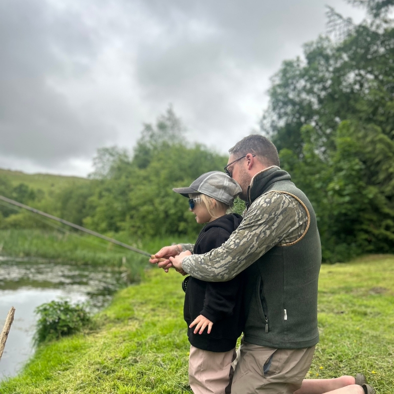 Curtis with daughter fishing