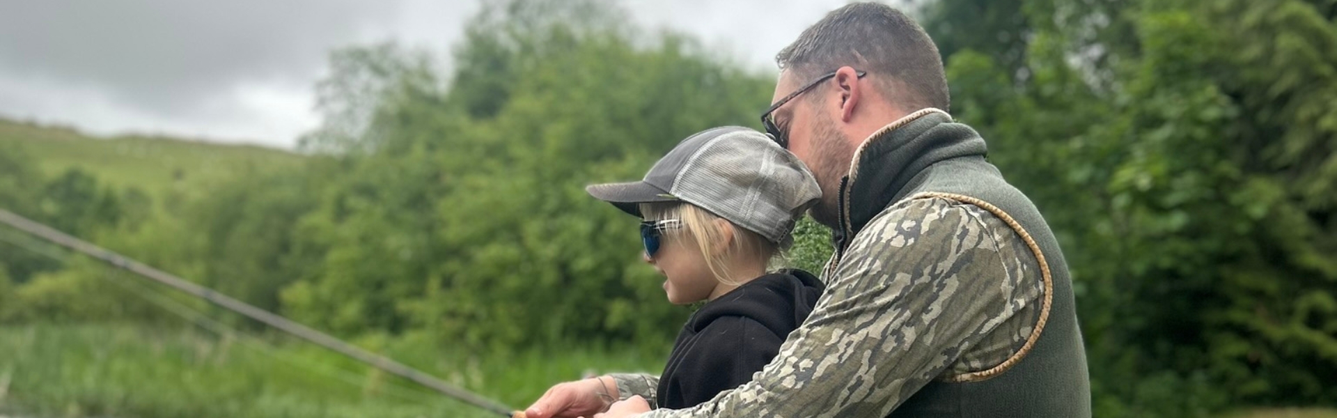 Curtis with daughter fishing