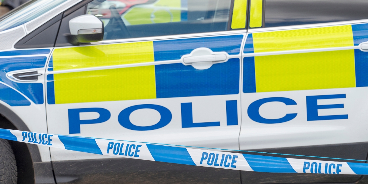 police car with tape across it