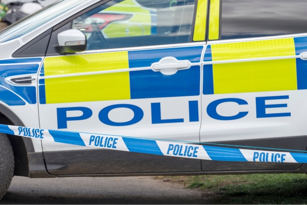 police car with tape across it