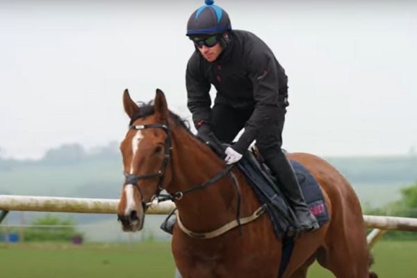 Johnny Burke riding a racehorse