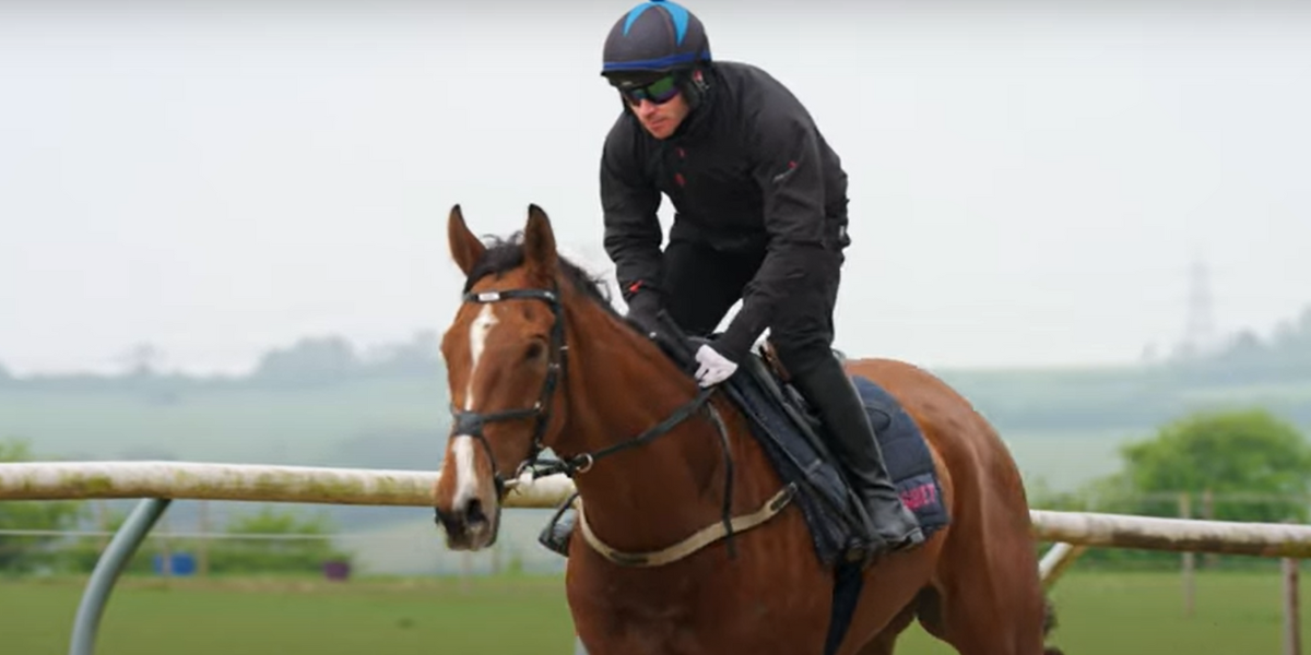 Johnny Burke riding a racehorse