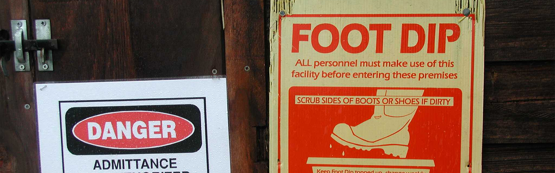Foot dip notice on a wall