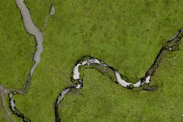 An overhead shot of wildfowlers in a gutter
